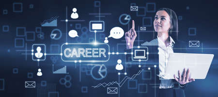 Businesswoman using laptop with creative business sketch with charts and graphs on blue background. Career, success, training, technology, communication, finance and solution conceptの写真素材