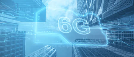 Creative 6G chip on abstract bottom up view city background. Internet speed and future concept....