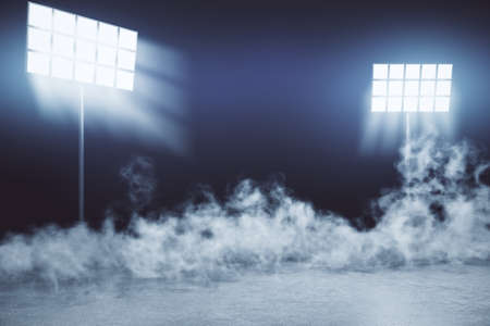 Creative interior with professional lighting equipment and smoke. Photo studio and stage concept. 3D...