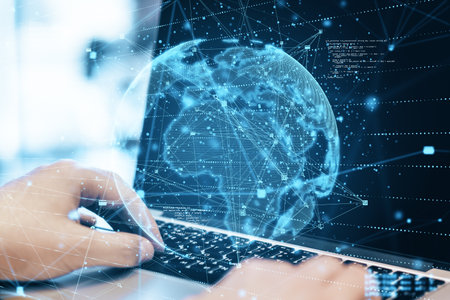 Close up of hands using laptop with abstract globe sphere with coding and polygonal network. Future,...