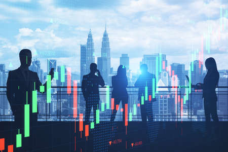 Crowd of businessmen and women on abstract city background with forex chart and devices. Communication, trade and money growth concept. Double exposureの写真素材
