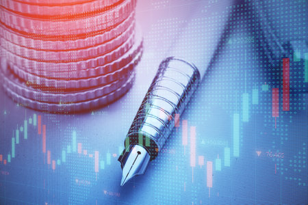 Close up of stacked coins, pen and forex chart on blurry desktop background. Financial management, money and trade concept. Double exposureの写真素材