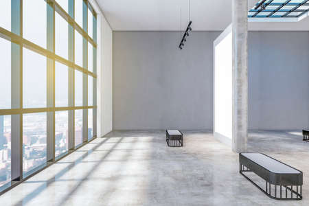 Bright concrete gallery interior with windows and city view, daylight, empty posters and shadows. Exhibition concept. Mock up, 3D Renderingの写真素材