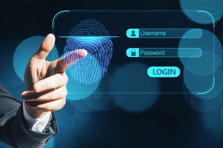 Close up of businessman hand using glowing abstract fingerprint interface on blurry blue bokeh...
