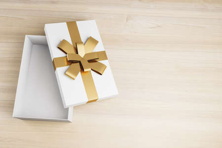 Top view of open white present box on wooden background with mock up place. Birthday, wedding, anniversary and christmas celebration. 3D Renderingの写真素材