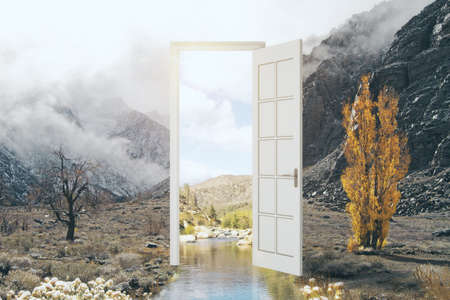 Creative open door leading to beautiful landscape. Dream, opportunity and success concept. 3D Renderingの写真素材