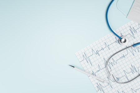 Top view of blue desktop with stethoscope, cardiogram pen and mock up place. Doctor's office, workplace and diagnosis concept. 3D Renderingの写真素材