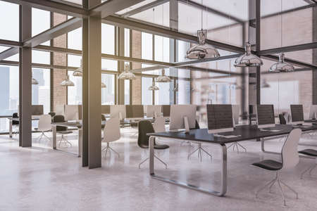Luxury loft brick and concrete coworking office interior with furniture, computer monitors and...
