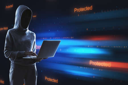 Hacker using laptop with abstract binary code on blurry background. Cyber attack and hacking concept. Double exposureの写真素材