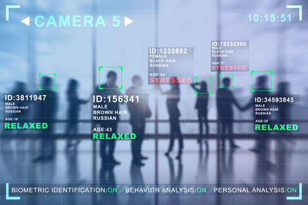 Creative image of businesspeople in blurry office interior with camera cctv facial recognition interface. Biometric scanning and security concept. Double exposure.の写真素材