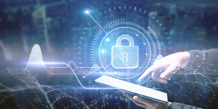 Close up of businessman hand using tablet with bstract business chart with padlock interface glowing...