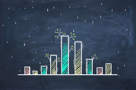 Creative sketch of growing colorful business graph with tree branches on chalkboard background....
