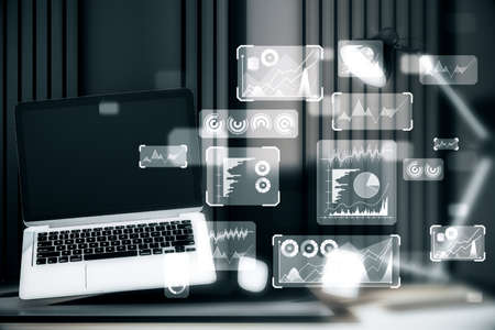 Abstract laptop with glowing business chart and graph hologram on blurry background, Technology and...