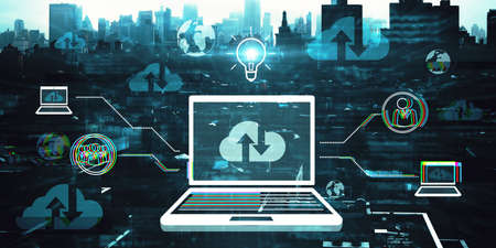 Creative abstract laptop with various icons and digital cloud computing interface on dark city...