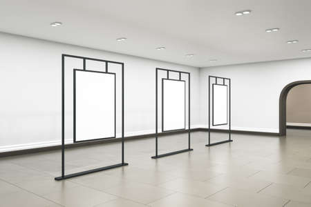 Modern exhibition hall interior with arch entrance and empty white mock up poster hanging on frames. Art and gallery concept. 3D Renderingの写真素材