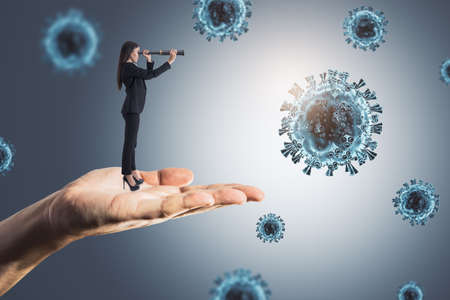 Abstract hand holding business woman looking into the distant future on gray background with virus....