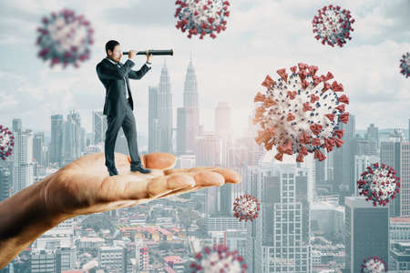 Abstract hand holding man with telescope looking into the distant future on daylight city background with virus. Pandemic, epidemic, coronavirus, health and medicine conceptの写真素材