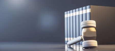 Close up of lawyer's gavel and books on light backdrop with mock up place. justice and judge concept. 3D Renderingの写真素材