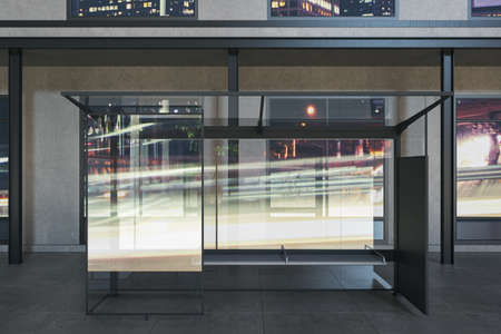 Modern glass bus stop with city reflections and daylight. Transport and urban concept. 3D Renderingの写真素材