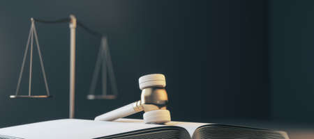 Close up of gavel, book and scales on blurry gray background with mock up place. Law and jurisdiction concept. 3D Renderingの写真素材