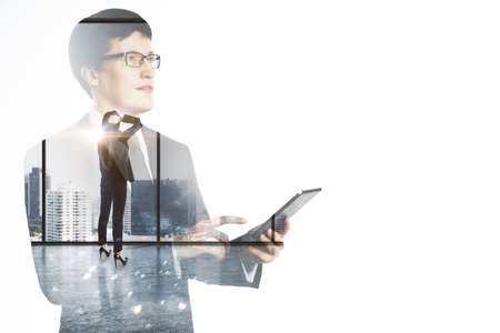 Portrait of attractive thoughtful european businessman and woman using smartphone on bright city office view background with mock up place. Technology, communication and success concept. double exposureの写真素材