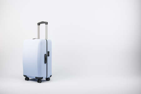 Suitcase on white wallpaper with mock up place. Luggage, bag and airplane concept. 3D Rendering