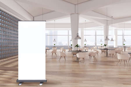 Modern spacious concrete restaurant interior with wooden flooring, empty white mock up advertising poster, panoramic city view, tables and chairs. Cafeteria project concept. 3D Renderingの写真素材