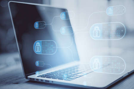 Close up of laptop with abstract big data and security nodes on blurry background. Technology, web safety and programming concept. double exposureの写真素材