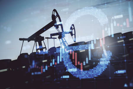 Abstract backlit oil pumping equipment on sky background with glowing growing forex chart with euro sign. Trade, finance and economy concept. double exposureの写真素材