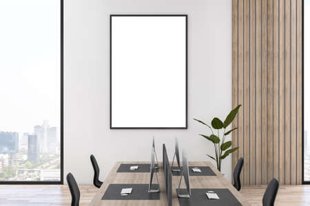 Modern wooden and concrete coworking office interior with empty mock up poster on wall, furniture,...