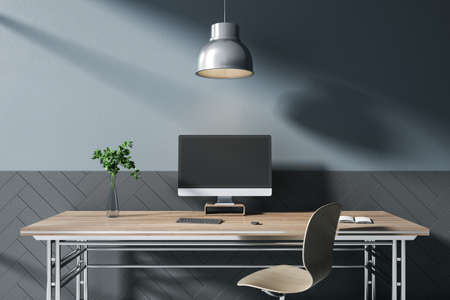 Contemporary designer wooden desktop with empty computer screen, lamp, decorative plant, chair and...
