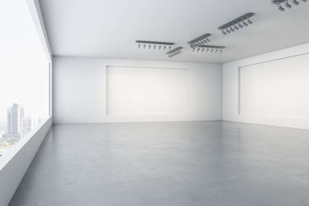 Empty concrete gallery interior with window and city view, mock up place on walls and daylight. museum concept. 3D Renderingの写真素材