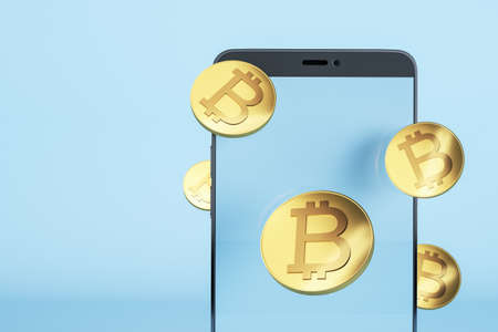 Close up of smartphone with creative bitcoins on blue backdrop with mock up place. Crypto on mobile...