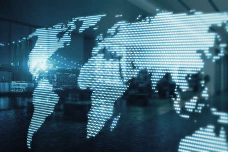 Glowing digital map hologram on blurry blue city backdrop. Worldwide technology and network concept. double exposureの写真素材