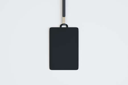 Blank black mock up badge on white background. ID and conference concept. 3D Rendering