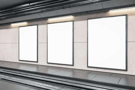 Perspective view on blank white posters on light gray wall with place for your logo or text behind rails in abstract empty underground area. 3D rendering, mockupの写真素材