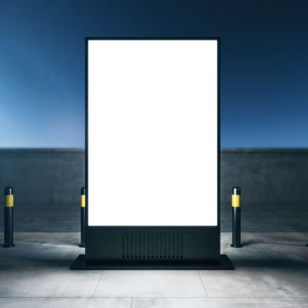 Outdoor advertising concept with front view on blank white illuminated signboard with space for your logo or text on night city street background. 3D rendering, mock upの写真素材