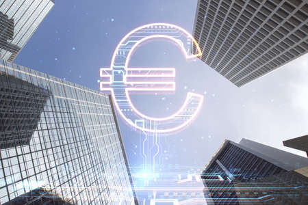 Creative glowing euro sign hologram on blurry city buildings background. Online banking, technology and currency concept. double exposureの写真素材