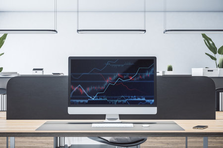 Close up of computer monitor with forex chart on screen. Coworking office desktop background. 3D...