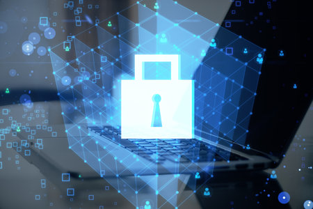 Close up of laptop with creative glowing blue padlock grid hologram on blurry bokeh background....