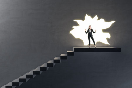 Inspiration, right decision and motivation concept with happy and satisfied woman on the top of stairway on big hole in dark wall backgroundの写真素材