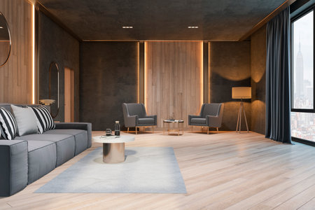 Stylish living room with gray sofa, modern coffee table on gray carpet and dark armchairs on wooden...