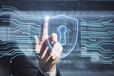 Close up of businessman hand pointing at abstract glowing secure web safety and protection hologram on blurry office interior background. double exposureの写真素材