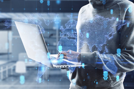 Close up of hacker hands using laptop with abstract glowing map hologram on blurry background....