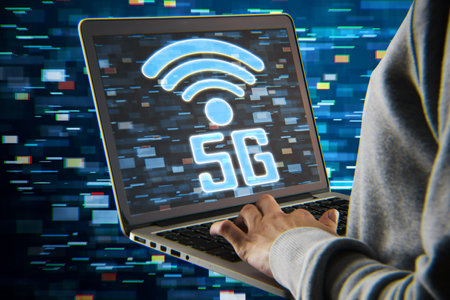 Close up of hacker hands holding laptop with 5G glitchy icon hologram on blurry backdrop. 5th Generation Wireless Internet Network connection information technology illustration, hacking concept. mobile devices telecommunications business web networkingの写真素材