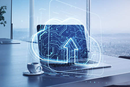 Close up of laptop with cloud computing hologram on blurry office desktop background with coffee cup...