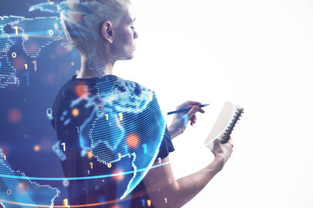 Side view of young blonde woman writing in notepad with abstract globe sphere with coding and polygonal network on blurry white background. Future, technology and digital world concept. double exposureの写真素材