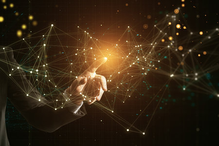 Close up of man hand pushing and using glowing polygonal mesh interface on dark background. technology and network conceptの写真素材