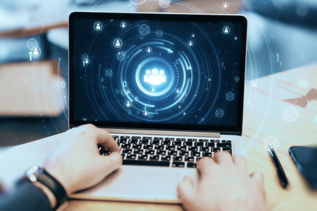 Close up of male hands using laptop on desktop with glowing people icons. Creative global structure...