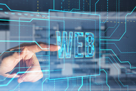 Close up of male hand pointing at glowing linear web text hologram on blurry office interior background. Digital nft, technology and future concept. double exposureの写真素材